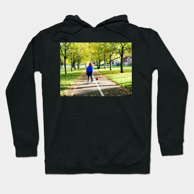 Boy playing football in autumn Hoodie by fantastic-designs